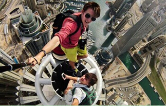 A 19-year-old Russian man challenged the limit to take selfies at the top of Dubai's tallest building.jpg