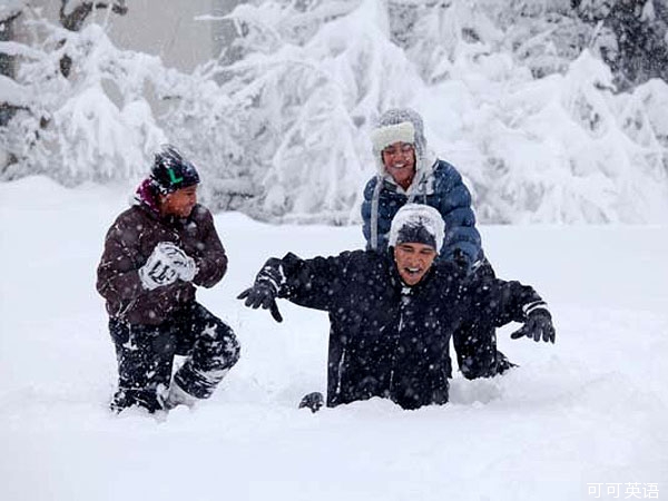 Happy time at the president’s house: Obama and his daughters have a snowball fight.jpg