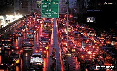 Traffic jams test the patience of workers in Beijing.jpg