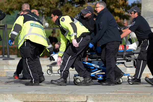 Canadian men shot guards and broke into the Capital Parliament Building.jpg