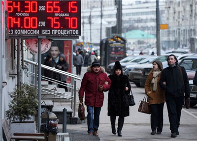 Standard & Poor’s downgraded Russia’s sovereign debt rating to junk.jpg