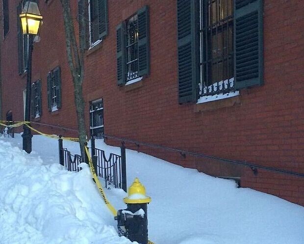 Kerry was fined $50 for not sweeping the snow in front of his door .jpg