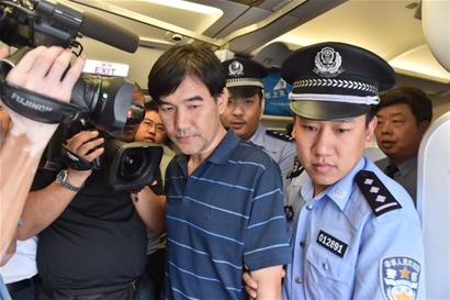 The'red wanted' suspect Sun Xin was detained to return to China.jpg