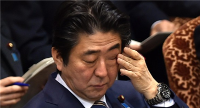 Abe hopes that economic growth will solve the debt problem.jpg