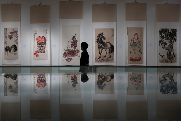 A Chinese painter made a profit of tens of millions of yuan in exchange of fake works.jpg