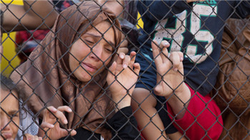 The United States says it will accept at least 10,000 Syrian refugees next year.jpg