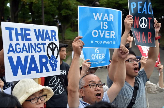 Japanese people rallied in the rain to oppose the security bill.jpg