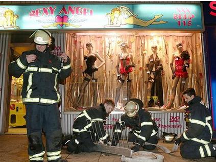 A fire in a German sex shop, customers continue to watch porn .jpg