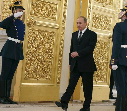 Putin walks with a peculiar "gunman gait".jpg