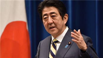 Abe said Japan is no longer in deflation.jpg