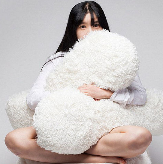 South Korean designer makes a "hug sofa" to cure loneliness.jpg