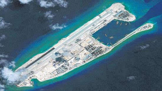 A Chinese military plane made its first public landing on Yongshu Jiao to transfer three seriously ill workers.jpg