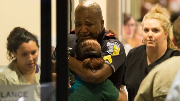 5 Dallas police officers were shot and killed by gunmen. 6 police officers were injured. .jpg