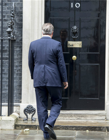 Moving and transferring jobs, Cameron seemed a bit miserable when he was improperly prime minister.jpg