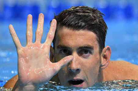 Phelps grabbed tickets to Rio in the 5th Olympic Games and became the first American swimming athlete.jpg
