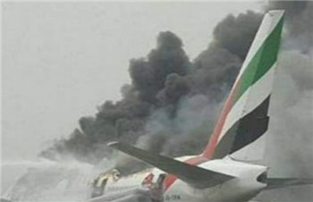 A Boeing 777 passenger plane caught fire after an emergency landing in Dubai.jpg