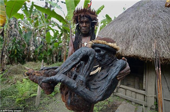 The almost perfect smoked mummies of the Papua Deep Hill Tribe.jpg