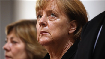 Merkel called on Germany's mainstream political parties to unite against the right-wing forces.jpg
