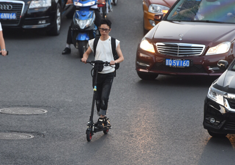 Beijing and Shanghai ban electric scooters on the road.jpg