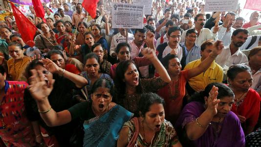 Workers from all walks of life in India broke out a general strike.jpg