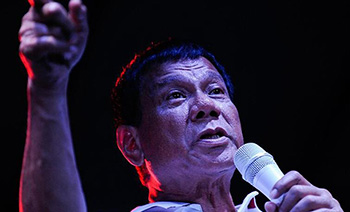 During his visit to Japan, Duterte downplayed his approach to China.jpg