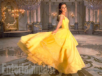 The poster of the new version of "Beauty and the Beast" is exposed. Watson wears the same yellow dress as the animation .jpg