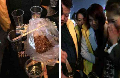 Employees who failed to complete their performance were fined to eat live breadworms in public! .jpg