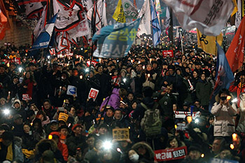 韩国反对党坚持推进弹劾总统动议.jpg
