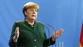 Merkel is the guardian of freedom and democracy.jpg