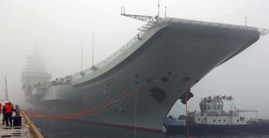 The aircraft carrier passed near Taiwan, and China said it was committed to peace.jpg