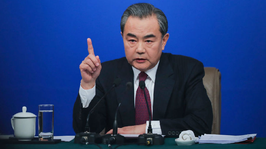 中国外长质问美朝是否真准备“迎头相撞”.jpg