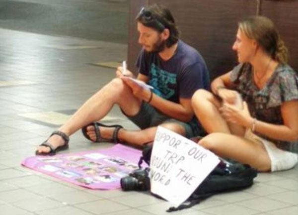 Western backpackers begging to travel all the way.jpg