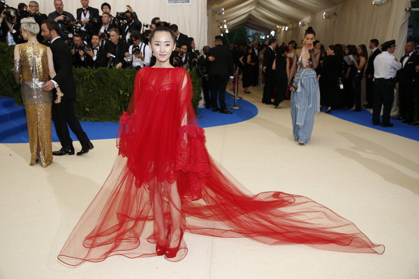 North Korean refugees on the red carpet of the Met Gala.jpg