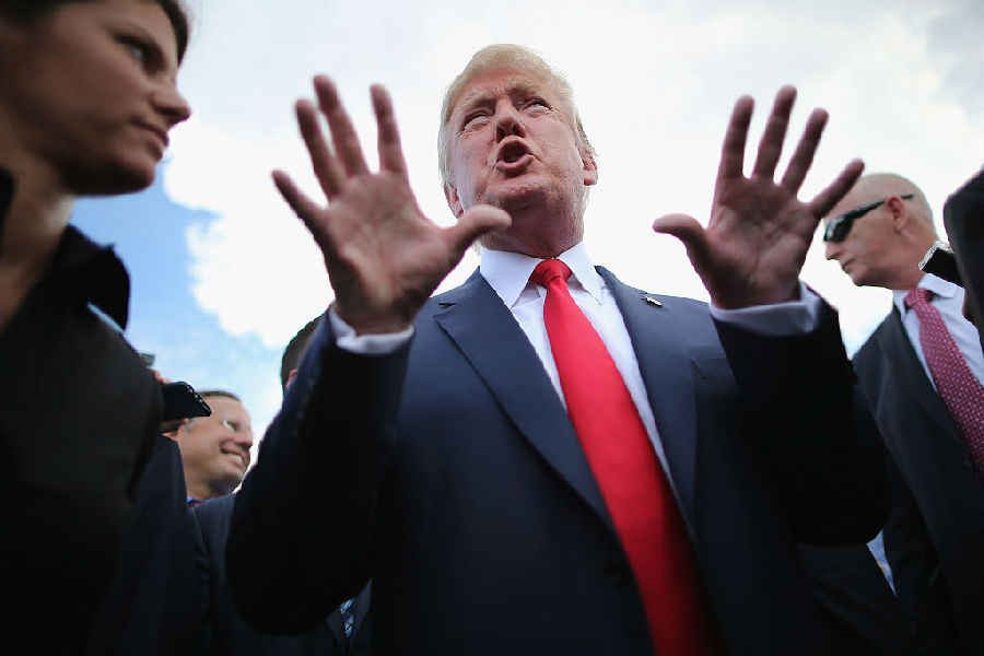 Trump supports Saudi Arabia and other countries to isolate Qatar.jpg