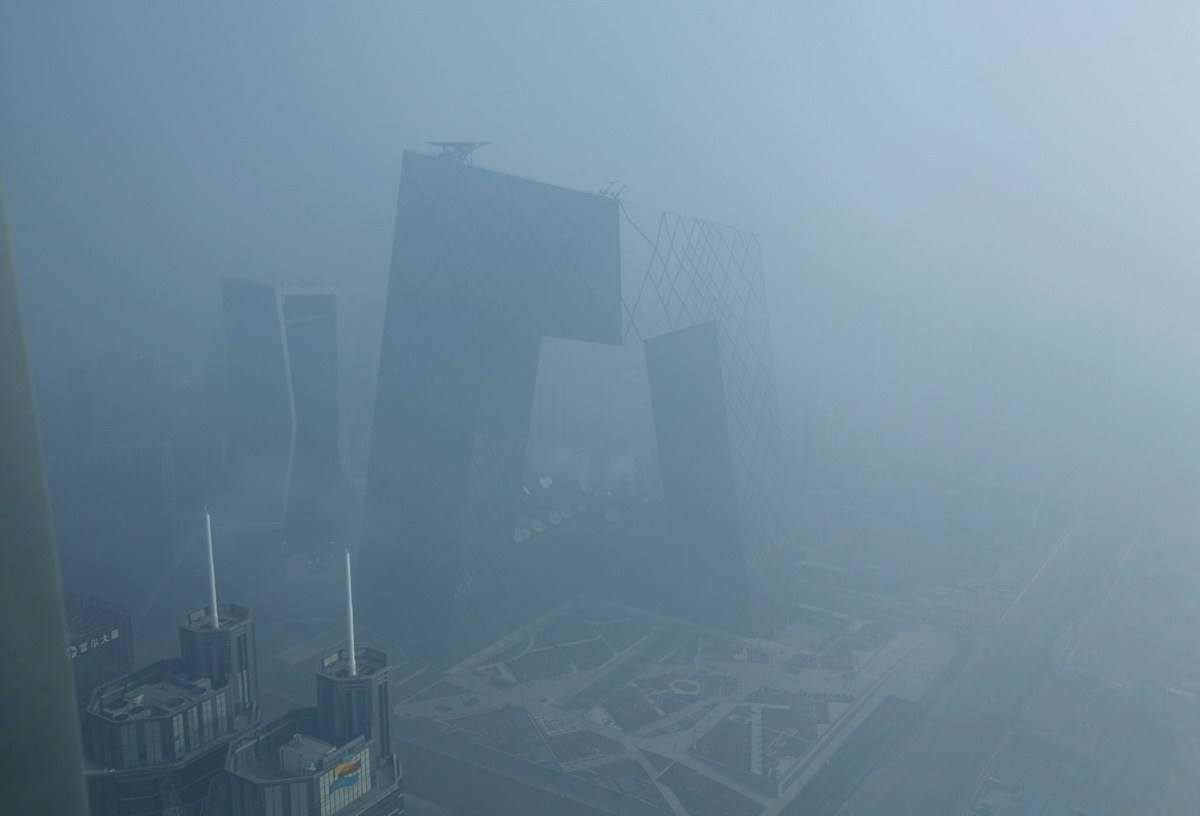 Smog beguiles The  CCTV headquarters.