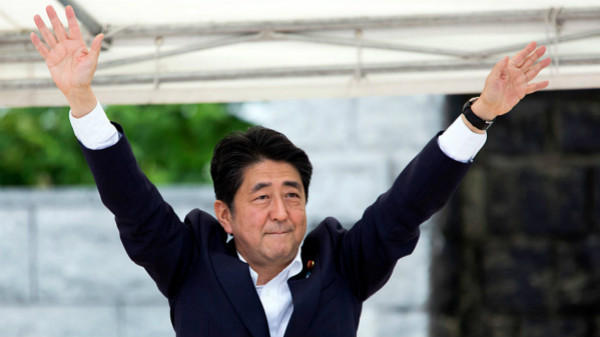 Japan's ruling coalition election victory paved the way for Shinzo Abe to revise the Constitution.jpg