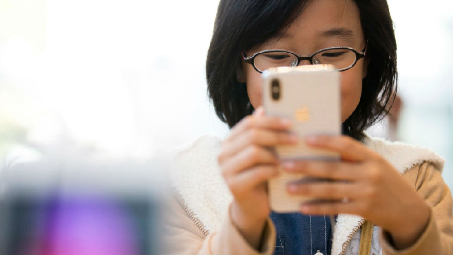 投资者敦促苹果解决儿童玩手机成瘾问题.jpg