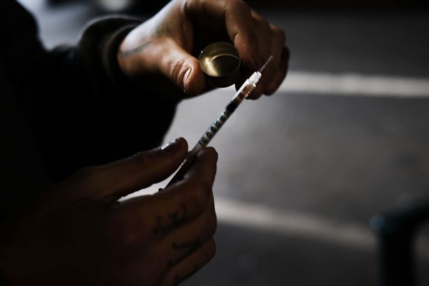 Heroin caused me to lose my family and teeth, and even almost died because of it.jpg