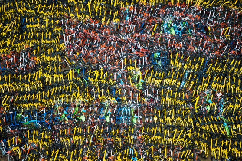 Aerial photography of Shanghai's shared bicycle cemetery. Colorful like a tulip field.jpg