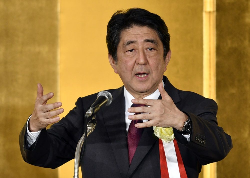 Japanese Prime Minister Shinzo Abe warmly welcomes Britain to join the TPP.jpg