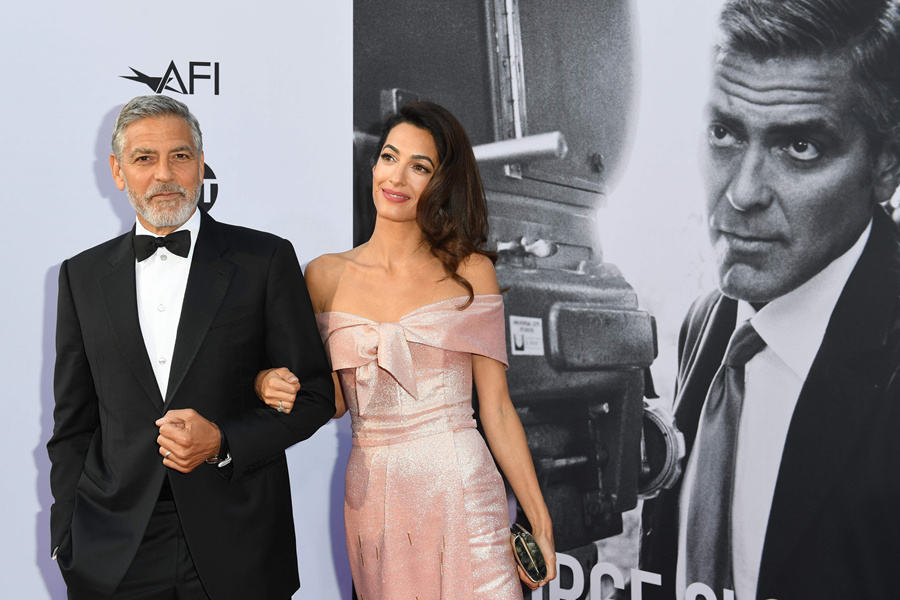 George Clooney introduced himself as the "Husband of Amal" and he was too spoiled for his wife.jpg