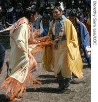 American Indian dancers Corina Drum and Mary Snowball take part in the Grand Entry at the Omaha Indian Powwow in 1983