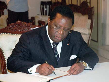 Youssouf Bakayoko, foreign minister of the Republic of Cote d&apos;Ivoire, signs on the book of condolence during a mourning ceremony held at the Chinese Embassy in Abidjan, capital of Cote d&apos;Ivoire , on May 19, 2008. Staffers of the Embassy, local Chinese and overseas Chinese and some U.S officers attended the mourning ceremony on Tuesday for the victims of the 8.0-magnitude quake on Richter scale hitting southwest and northwest China&apos;s regions on May 12.
