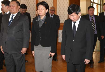 Mongolian Foreign Minister Sanjaasuren Oyuun(2nd, R, Front) and Mongolian State Great Hural Chairman Danzan Lundeejantsan (1st,R, Front) attend the mourning ceremony held at the Chinese Embassy in Ulan Bator, capital of Mongolia, on May 20, 2008. China began on May 19 three-day mourning for the victims of the 8.0-magnitude quake on Richter scale hitting southwest and northwest China&apos;s regions on May 12. 